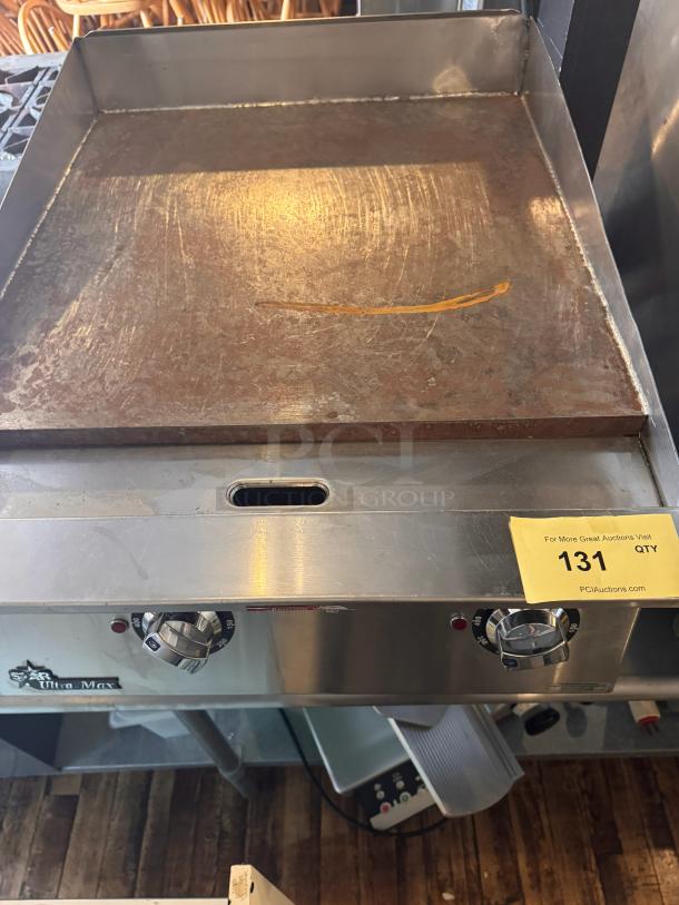 Star Ultra-Max 24" electric griddle, stainless steel, countertop model, visible wear on cooking surface, dual control knobs.