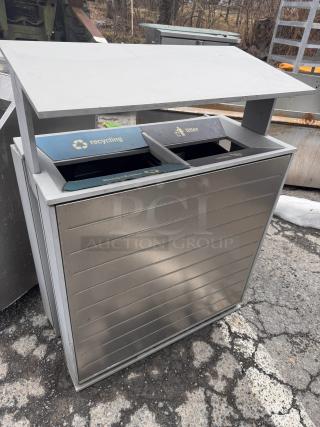 Stainless steel recycling receptacle with separate compartments for recycling and litter, labeled with icons, in good condition.