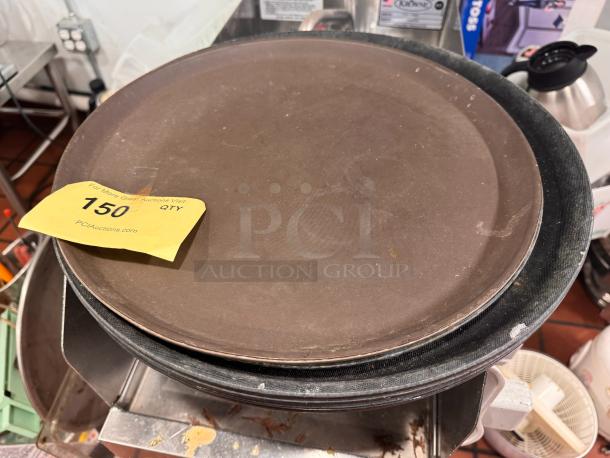 Lot of 4 round trays, lightly worn, stackable. Auction tag reads "150 QTY" from PCIAuctions.com.