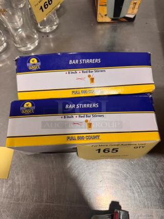 Lot of 2 boxes of Sunset 8-inch red bar stirrers, each box contains 500 stirrers.