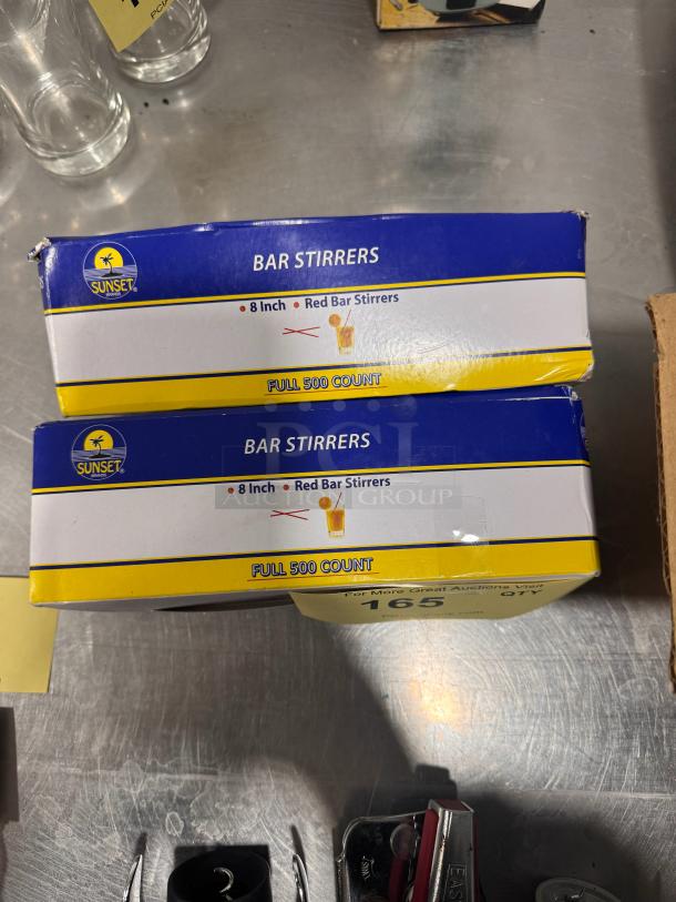 Lot of 2 boxes of Sunset 8-inch red bar stirrers, 500 count each, in original packaging.