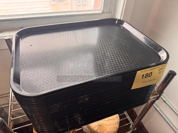 Black plastic tray with textured surface, square edges, in good condition. Auction label indicating number 180.