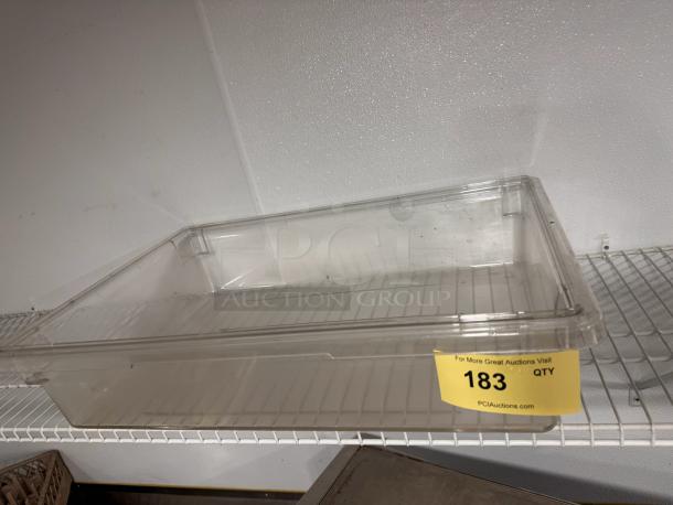 Cambro plastic food storage container, 18x26x6in, clear, excellent condition. Auction tag: "183 QTY PCIauctions.com".