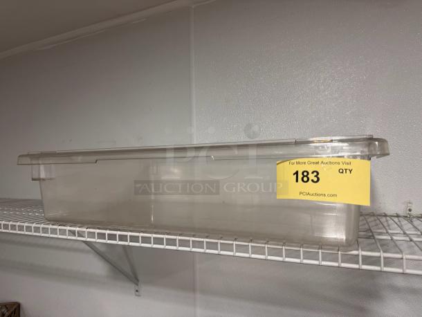 Cambro plastic food storage container, 18x26x6in, clear, in good condition, on shelf with auction label "183".