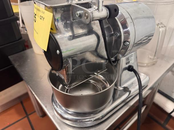 Estella electric hard cheese grater, stainless steel, plug-in, excellent condition, visible yellow auction tag.