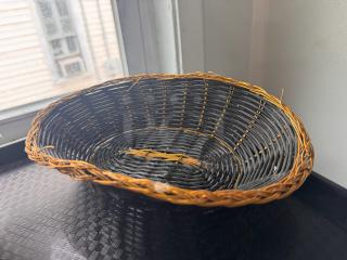 Woven food basket BIDX13, oval shape, brown and black pattern, good condition, intricate design.