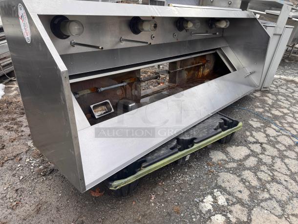 8Ft low profile exhaust hood, stainless steel, with light fixtures, moderate wear, visible label for model identification.
