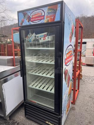TRUE GDM-26 single glass door refrigerator, tested and working, featuring promotional graphics, black trim, clean interior.