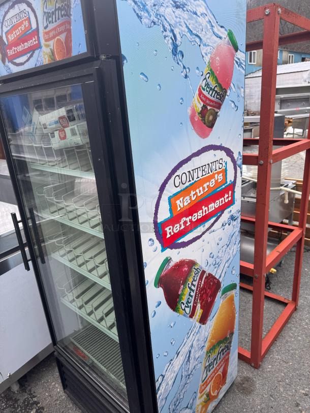 TRUE GDM-26 single glass door refrigerator, featuring vibrant side graphics. Tested, working, excellent condition.