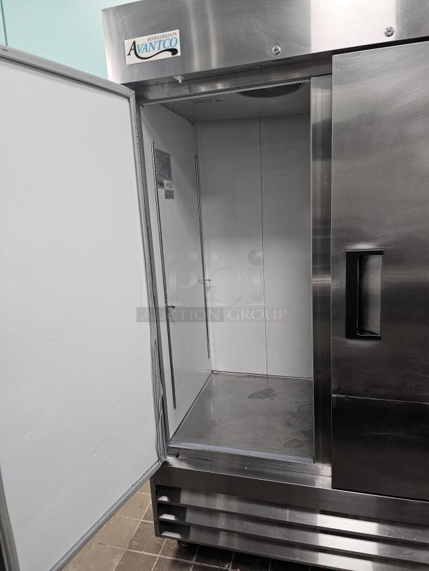 AVANTCO 2 solid door refrigerator, stainless steel, tested and working, open door, interior shelves, durable design.