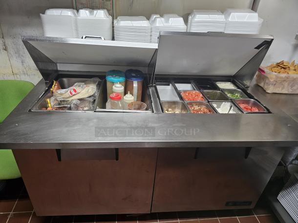 TRUE 60" prep table with open lids showing food compartments. Tested and working, stainless steel, ideal for commercial use.