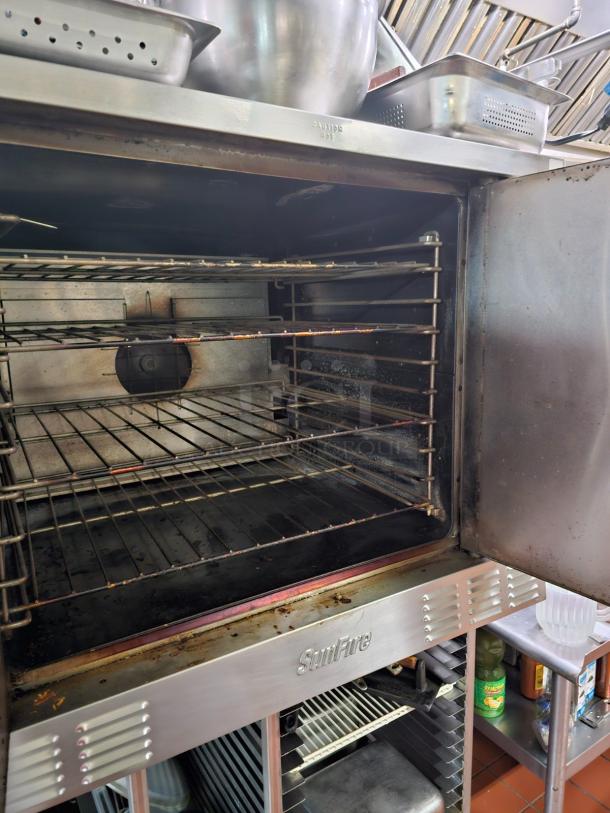 SUNFIRE full-size single deck convection oven, no stand. Features metal racks and stainless steel finish. Marked "Sunfire."