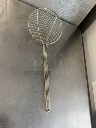 8" round wire skimmer with a mesh net and long handle, in excellent condition, ideal for frying and skimming tasks.