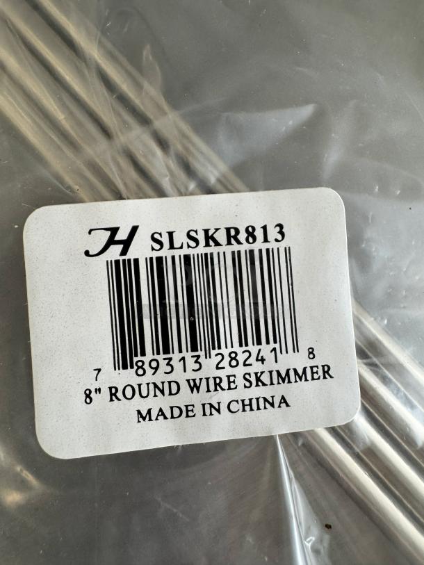 8" round wire skimmer with label showing model SLSKR813, barcode, and "Made in China." Item sealed in packaging.