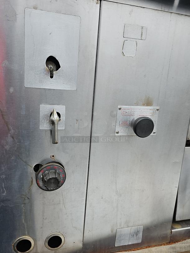 ATTIAS NG Single Deck Pizza Oven BIDX2, stainless steel, visible control knobs, fair condition with surface marks.