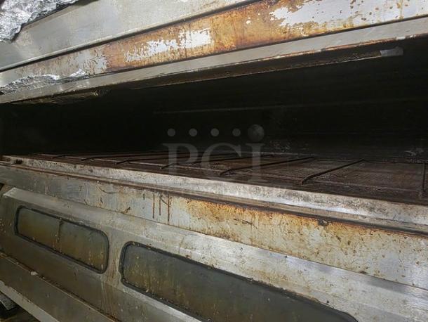 Baker's Aid Double Deck Oven BADO-434HC 208V 3ph, used condition, visible rust and wear, spacious cooking chamber.