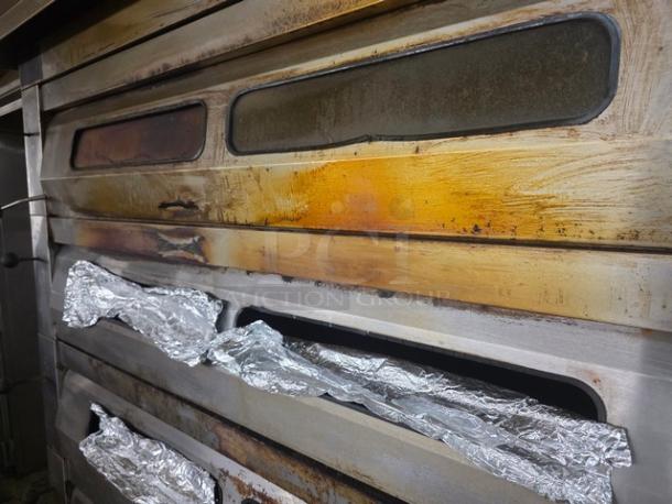 Baker's Aid Double Deck Oven BADO-434HC, 208V 3ph, shows signs of use with discoloration and foil covering vents.