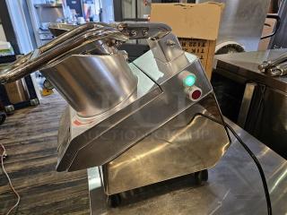 Vegetable Cutter VC-65MS 110V, stainless steel, with included attachments. Features power buttons; excellent condition.