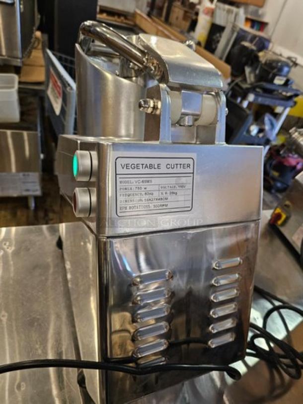 Vegetable Cutter VC-65MS 110V, stainless steel, with attachments. Model info: Voltage 110V, Capacity 660lbs/hr, RPM 300.