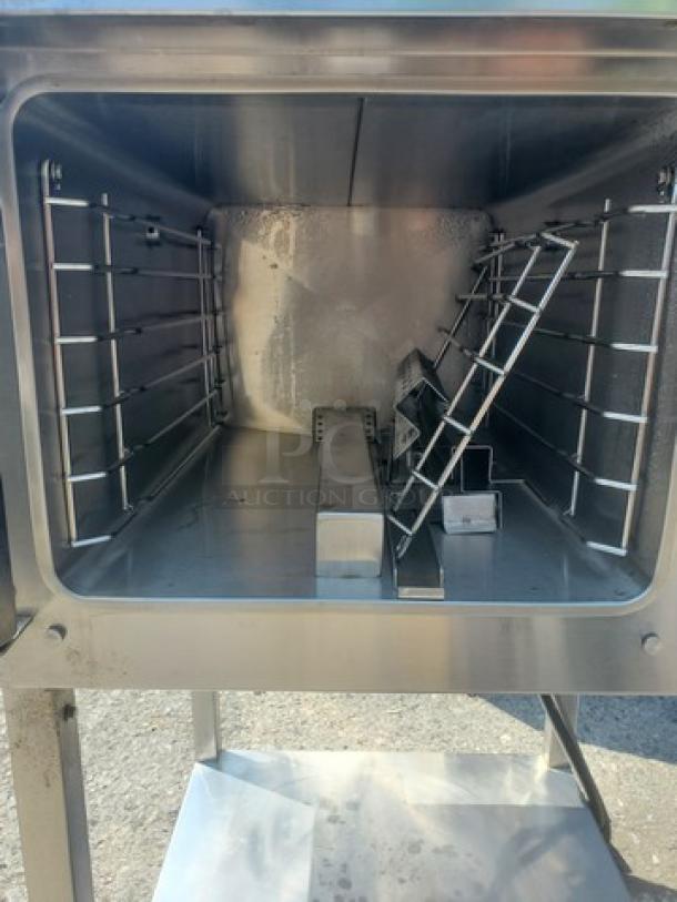 Vulcan VSX9000 Steamer in stainless steel, 208/240V, used condition; interior shows racks and shelving components.