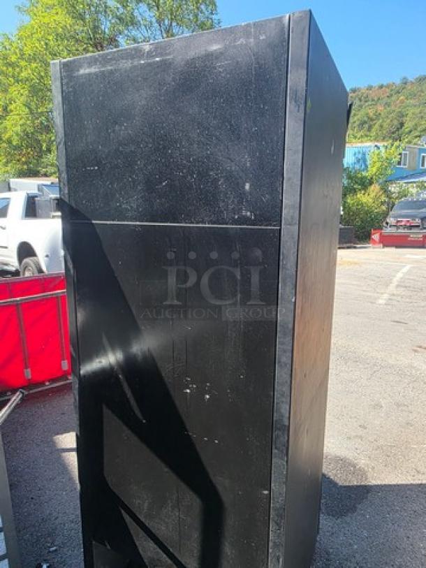 TRUE GDM-26 single deck cooler merchandiser, black finish, used condition, few surface scratches.