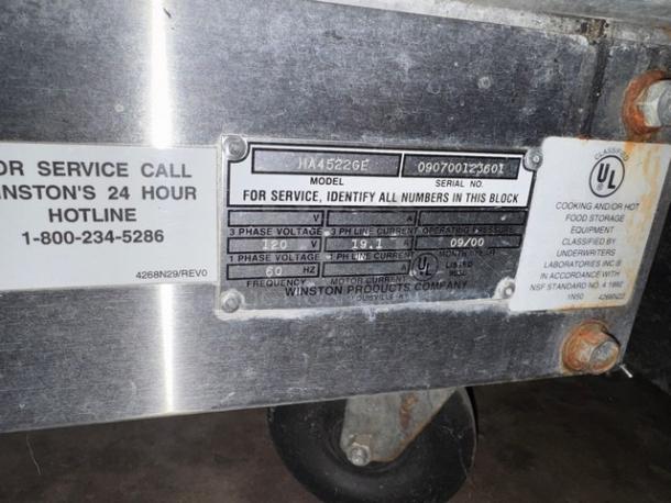 CVAP WINSTON HA4522GE holding cabinet label showing model, serial number, voltage, and manufacturer details.