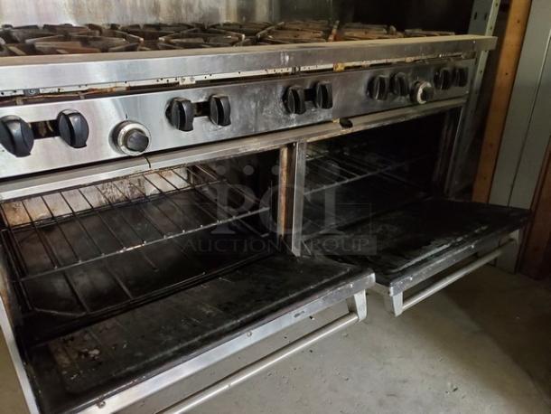 Garland SunFire 60" gas range with 10 burners, two standard ovens, and liquid propane setup. Visible wear, ideal for commercial kitchens.