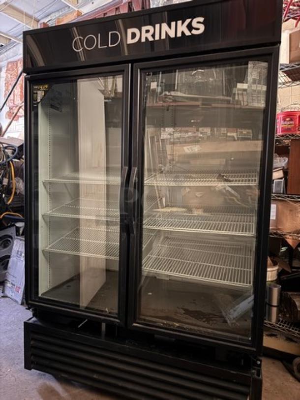 TRUE GDM-49 two glass door cooler with "COLD DRINKS" signage. Black exterior, tested and working, spacious shelving.