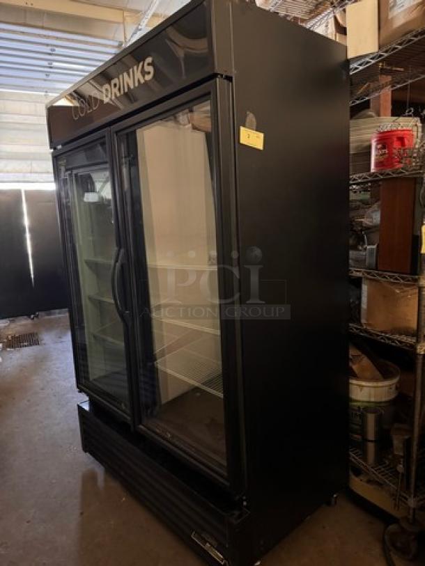 TRUE GDM-49 glass door cooler, dual doors, black exterior, "COLD DRINKS" label, tested and working condition.