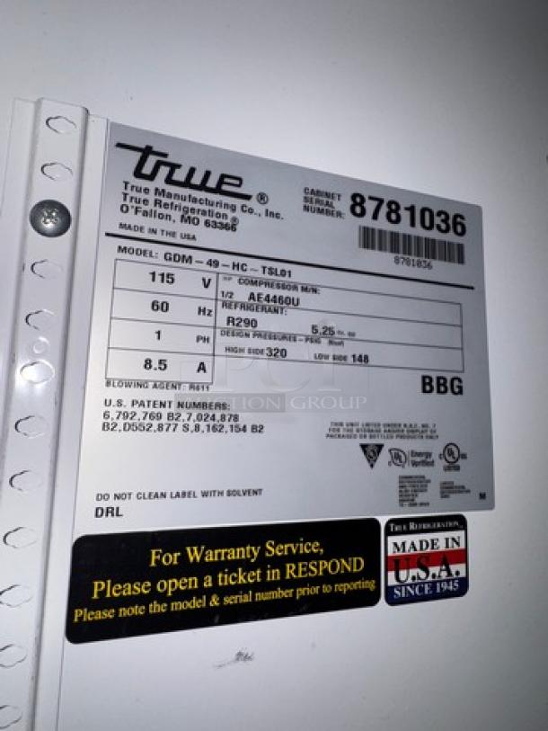 TRUE GDM-49 glass door cooler, model label shows 115V, R290 refrigerant, Made in USA, tested and working condition.