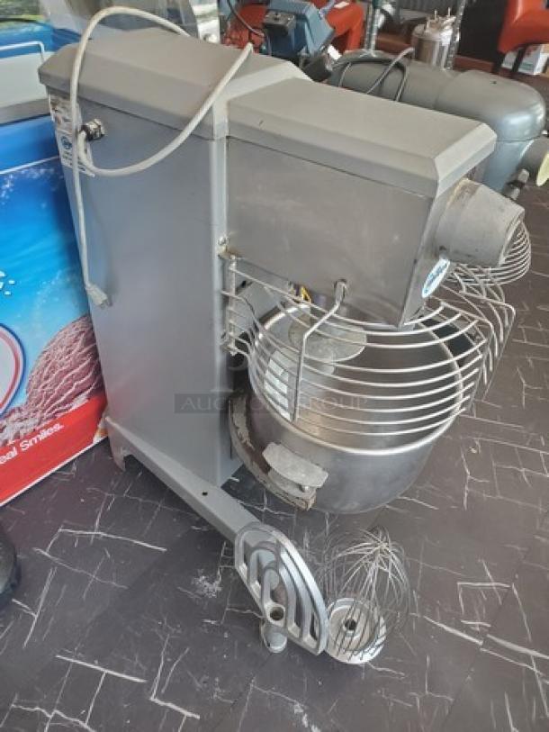 Univex SRM30+ 30Qt commercial mixer, gray finish, includes attachments. Good condition with visible protective guard.