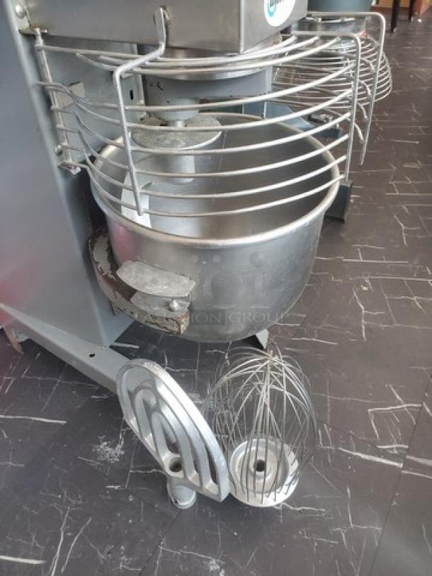 Univex SRM30+ 30Qt commercial mixer with attachments. Features stainless steel bowl, whisk, and flat beater. Good condition.