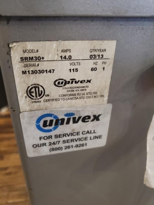 Univex SRM30+ 30Qt commercial mixer, model SRM30+, with attachments. Label shows specs: 14.0 amps, 115 volts, made 03/13.