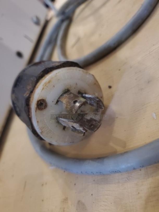 Univex SRM30+ 30Qt commercial mixer power plug, close-up view, shows wear. Includes necessary attachments.