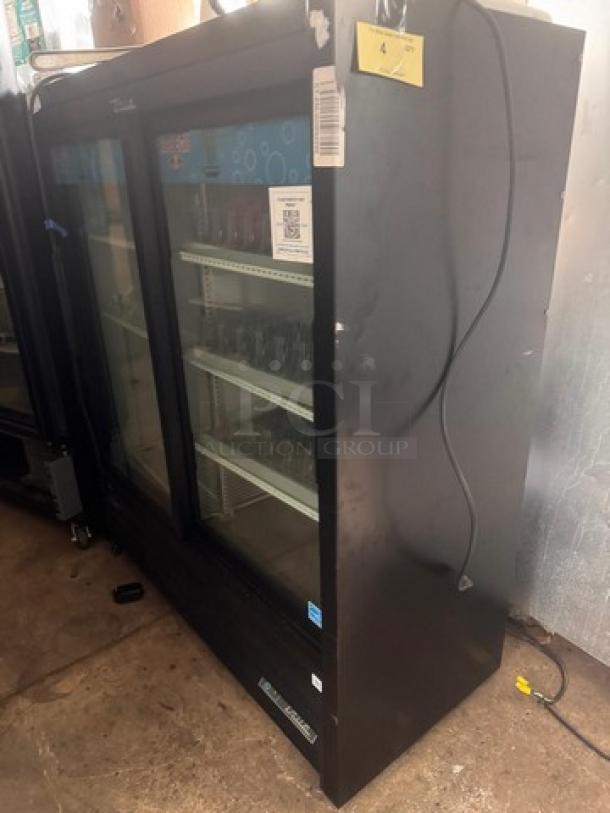 TRUE GDM-41SL two door cooler merchandiser, black, glass display doors, interior shelving, power cord attached, good condition.