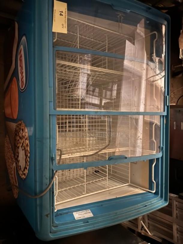 AHT RIO S 100 F ice cream freezer with sliding glass top, blue exterior, dual compartments, visible wear.