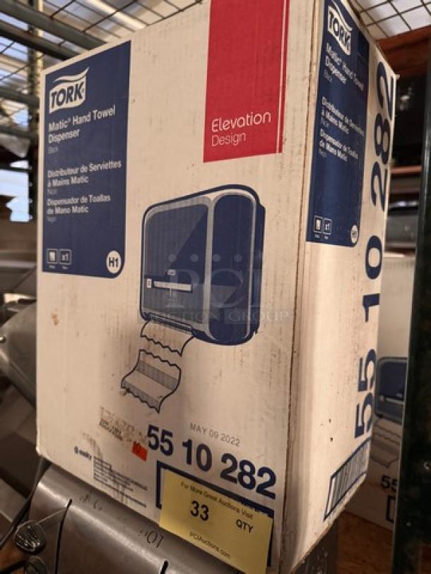 TORK Matic Hand Towel Dispenser in box, Elevation Design, model 55 10 282, new condition, marked May 09 2022.