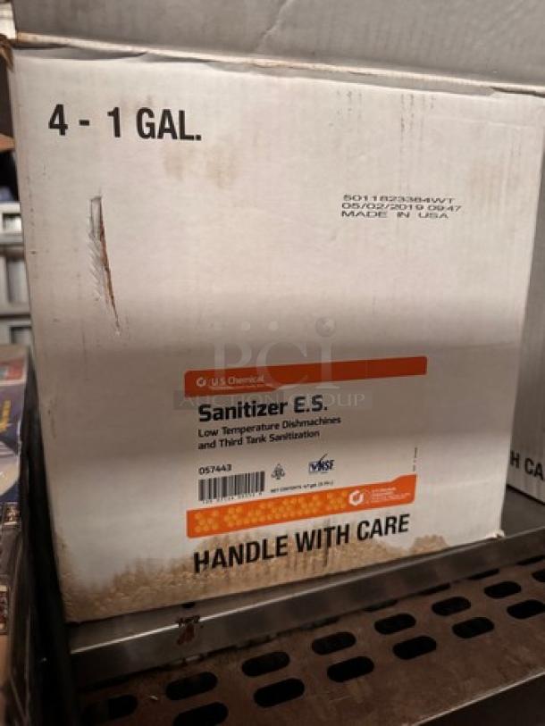 Lot of 3-1 Gallon boxes of U S Chemical Sanitizer E.S., for dishwashers, low temp. Includes NSF and manufacturing labels.
