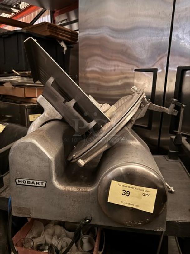 Hobart 1612E Meat Slicer, 115V, shown in used condition with visible brand marking.
