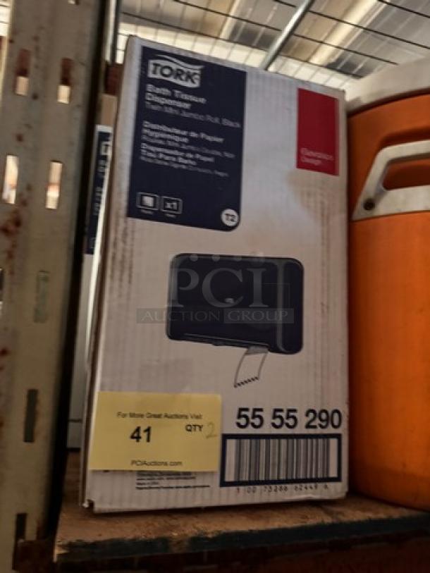 TORK Bath Tissue Dispenser in packaging, black, model number 55 55 290, quantity 2, new condition.