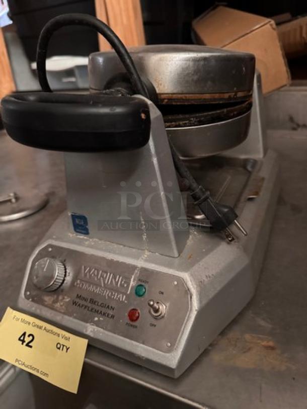WARING Mini Belgian Waffle Maker, stainless steel, used condition, features temperature control knob and indicator lights.