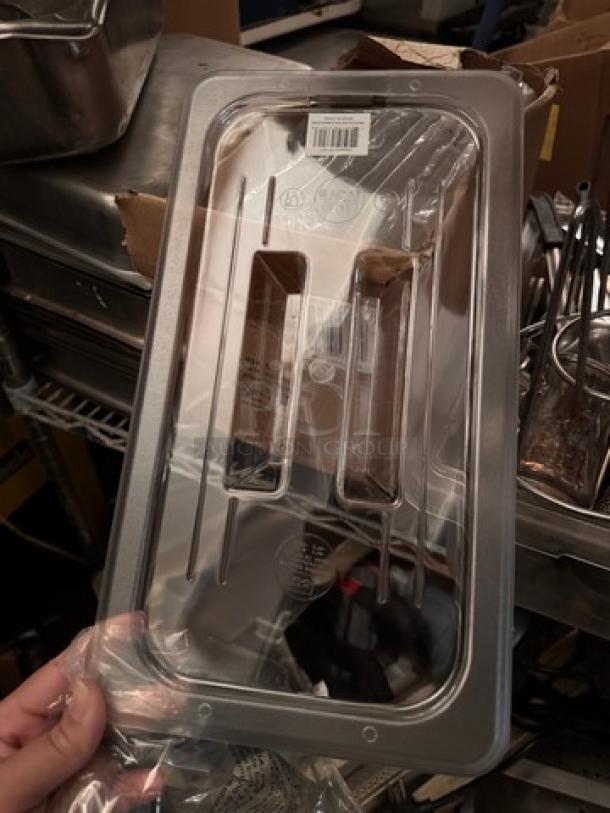 Brand new plastic lid for food pan, model BIDX9. Clear with ridges, protective packaging intact.