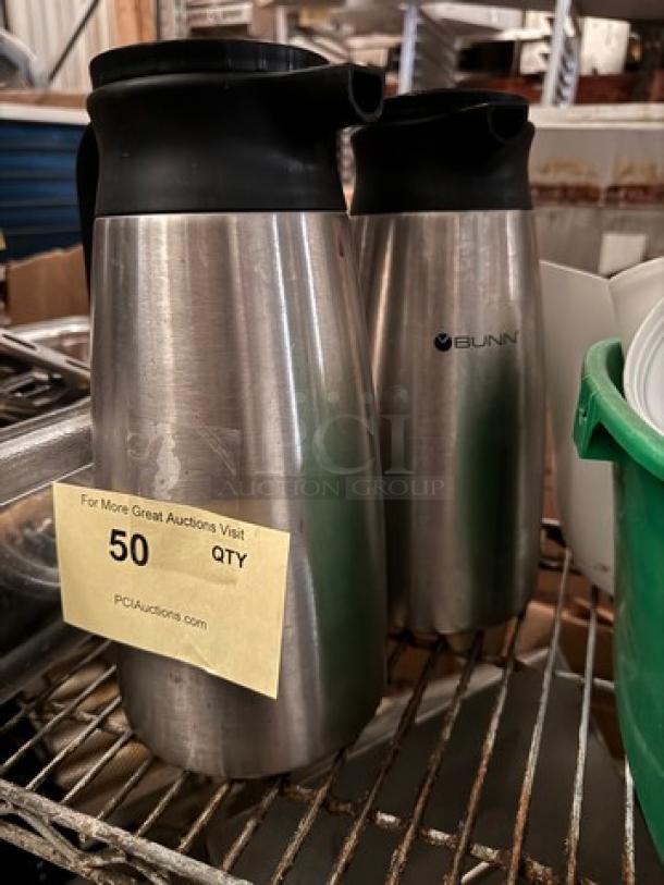 BUNN coffee carafe, model BIDX2, stainless steel, black lid, used condition, logo visible, quantity label shows 50 units.