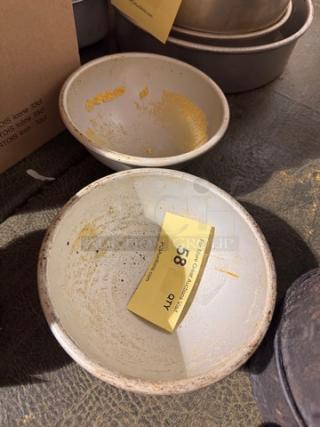 Metal baking pan with visible wear, includes auction tag number 58. Suitable for baking enthusiasts seeking vintage kitchenware.