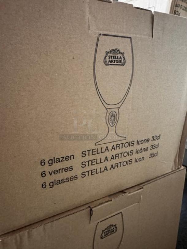 Cardboard box for 12 Stella Artois glasses, 33cl each. Includes logo print; labeled in Dutch, French, and English.