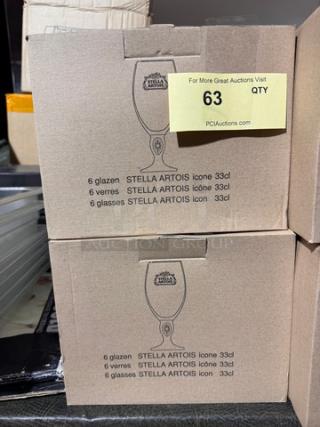 Two boxes of 6 Stella Artois Icone 33cl glasses, new in packaging, totaling 12 glasses. Box labeled in multiple languages.