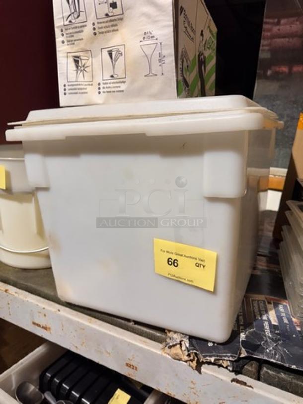White storage food container with lid, rectangular, used condition. Yellow label indicates "66 QTY." Suitable for organized storage.