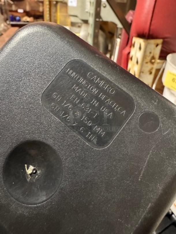 Cambro 1/6x6IN food pan, black. Features label: Camiero, Huntington Beach, CA, USA. Model BIDX6, in good condition.