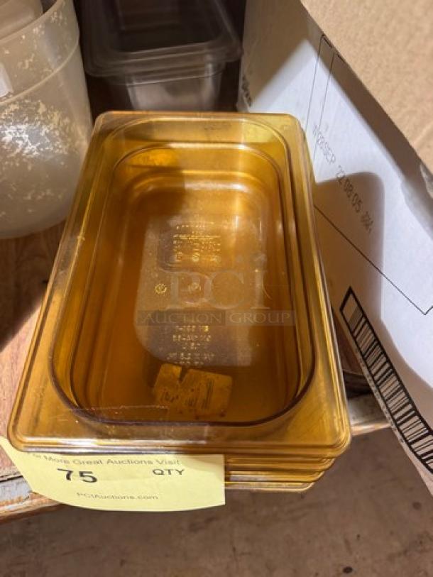 Stack of 1/4x2.5IN Food pan BIDX4, amber color, in good condition. Auction tag shows quantity and auction link.