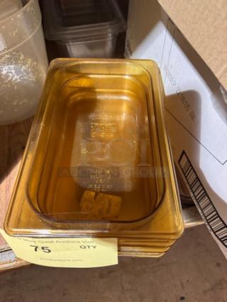 Stack of 1/4x2.5IN Food pan BIDX4, amber color, in good condition. Auction tag shows quantity and auction link.